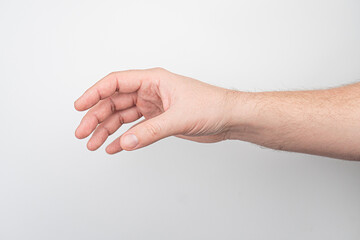 Close-up image of a fair-skinned arm in motion, extending from left to right, with visible veins and muscle tone Background is a solid color for contrast Even lighting creates soft shadows under el
