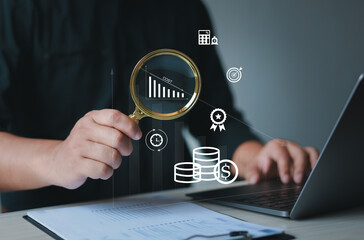 Cost and profit management concept. Businessman with cost reduction graph with down arrow for budget management and cost management. Financial concept for business cost reduction.