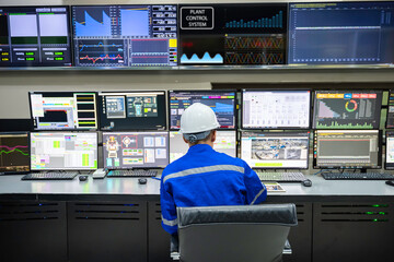 Engineer working at control room, Manager control system, Technician man monitoring program from a lot of monitor.
Specialist observes analytics dashboard,operator inspects digital interface