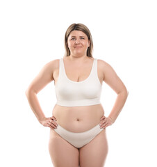 Fototapeta premium Weight loss. Plus size woman in underwear on white background
