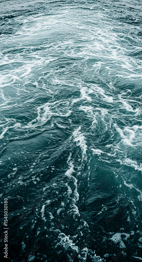 Poster dark teal water surface with white foam texture, creating a dynamic and restless appearance symboliz