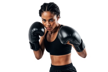 Confident African American female boxer in black sportswear and gloves in guard position, showing strength, focus, and athleticism on transparent background