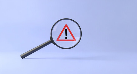 A magnifying glass focusing on a red triangle warning sign on a light blue background surface