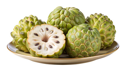Ripe custard apples arranged on a plate, one sliced in half to show seeds