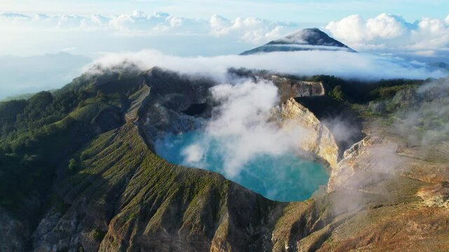 Aerial shot of the three colour lakes of Kelimutu volcano national park in Flores island, Indonesia