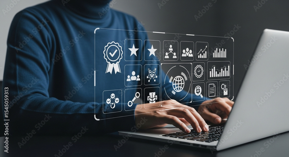 Aufkleber Man typing on a laptop with a digital display of business icons overlaid on the screen in front of him