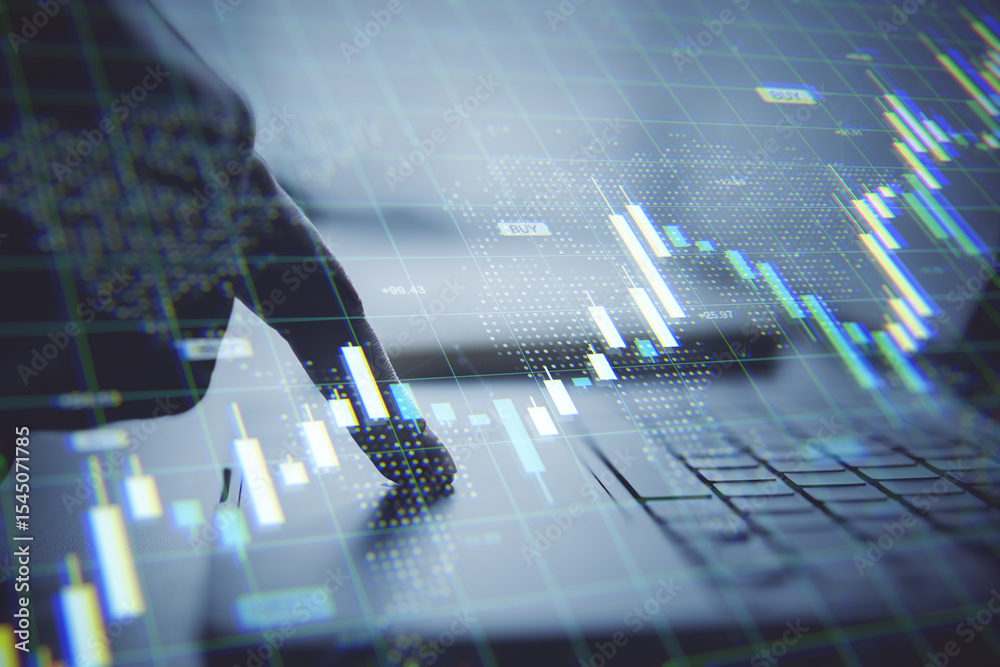 Poster finger pressing laptop keyboard with holographic stock market chart overlay in fintech business envi