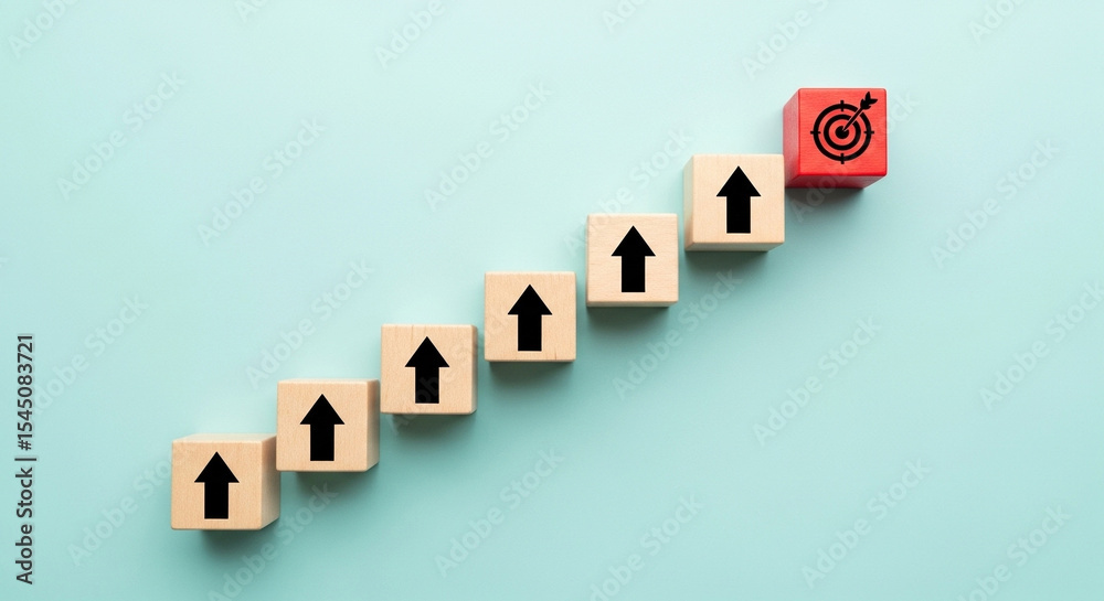 Poster Wooden blocks with arrows pointing up and a target block on a light blue background representing growth