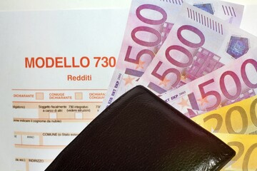Province of Florence , JUNE 20th 2025, many euro banknotes and leather wallet with the “Modello...