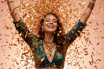 Joyful Woman Celebrating with Arms Raised in Confetti