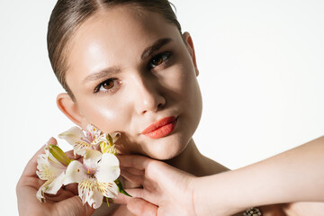 Skin care. Woman with healthy facial skin on isolated background. Beautiful model girl with natural...