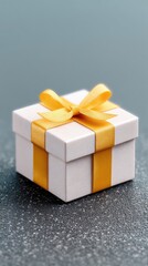 White Gift Box with Golden Ribbon on Black Background