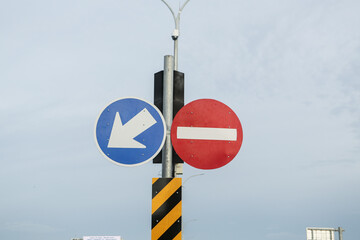 Traffic Signs on a Quiet Highway Intersection