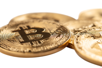 Close up of golden Bitcoin cryptocurrency coins.