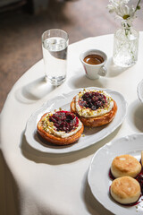 Portion of gourmet french brioche with berries and cream