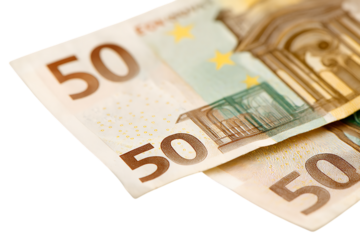 Close up of two fifty euro banknotes.