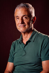 Portrait of an Older Man With Gray Hair and a Thoughtful Expression Indoors