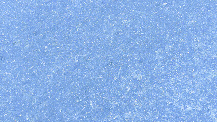 Close-up view of a light blue textured surface