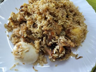 Famous Indian cuisine Biriyani, a mixed rice dish originating in South Asia, made with rice, meat...