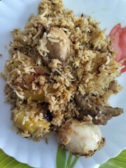 Famous Indian cuisine Biriyani, a mixed rice dish originating in South Asia, made with rice, meat or seafood and spices added with Egg.