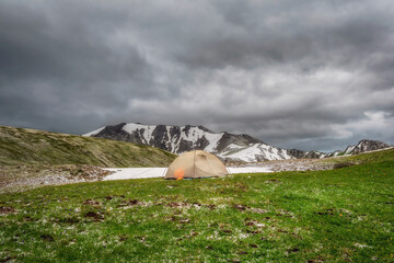 Awesome mountain scenery with tent.