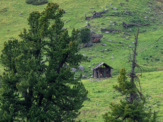 hunting lodge on a steep mountainside