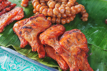 Grilled chicken on banana leaves