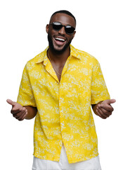 Cheerful African American man enjoying summer vacation wearing yellow floral shirt sunglasses and smiling with confident energy. 