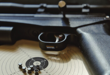 Pistol trigger target close-up sport sports shooter marksman hobby defense firearm rifle ammunition...