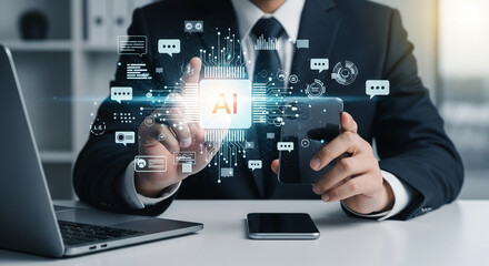 Businessman interacting with ai interface on smartphone and laptop on a white desk setup