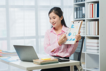 Young Woman Presenting Business Data Online