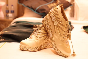 designer mens shoes decorated with chumki and pearls, in Indian ethnic style