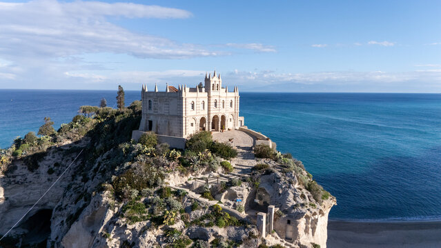 Aerial View of Historic Castle on Cliff Overlooking the Sea