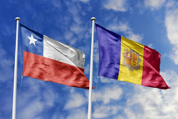 Flags of Chile and Andorra Waving Together Against a Blue Sky, Symbolizing Diplomatic Relations and International Friendship