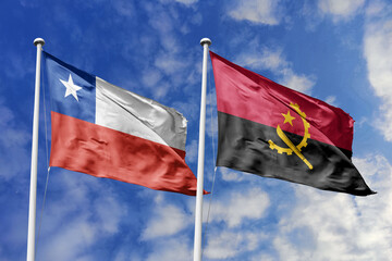Chile and Angola Flags Waving Together Against a Cloudy Blue Sky