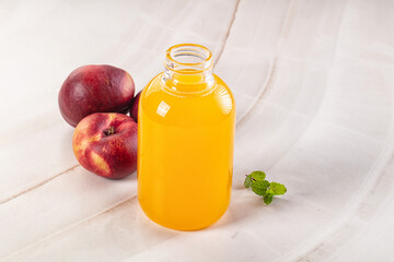 Vitamin beverage - peach juice glass