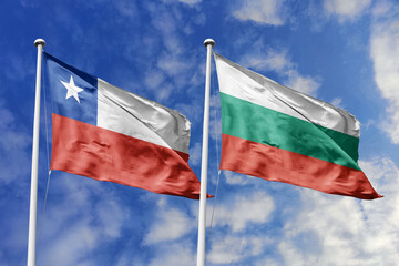 Flags of Chile and Bulgaria Waving Together Against a Blue Sky, Symbolizing Diplomatic Relations...