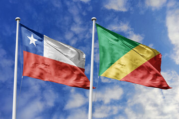 Flags of Chile and the Republic of the Congo Waving Side-by-Side Against a Bright Blue Sky,...