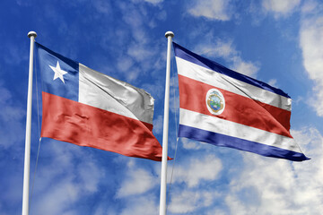 Flags of Chile and Costa Rica Waving Side-by-Side Against a Bright Blue Sky, Symbolizing Bilateral...