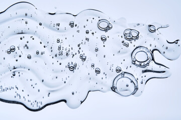 A drop of serum showing the texture of a cosmetic product.
