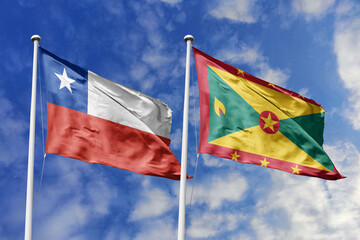 Flags of Chile and Grenada Waving Together Against a Vivid Blue Sky, Symbolizing International...