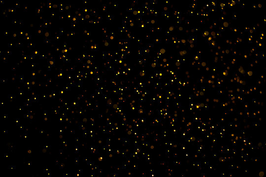 Golden Glittering Bokeh on Black