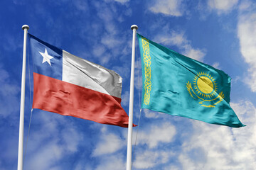 Flags of Chile and Kazakhstan Waving Together Under a Bright Blue Sky, Symbolizing International...