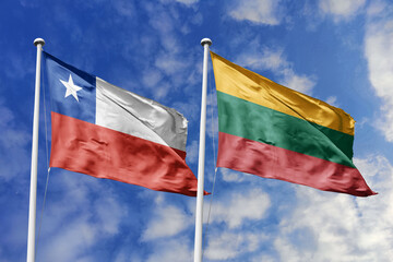 Flags of Chile and Lithuania Waving Together Under a Bright Blue Sky, Symbolizing International...