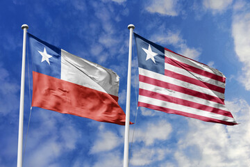 Flags of Chile and Liberia Waving Together Against a Vibrant Blue Sky, Symbolizing International...