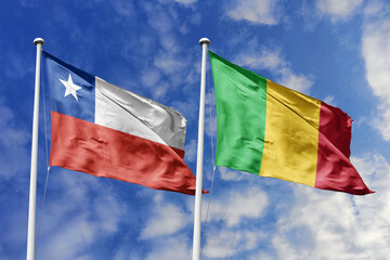 Flags of Chile and Mali Waving Together Against a Dynamic Blue Sky, Symbolizing International...