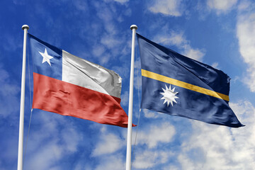 Flags of Chile and Nauru Waving in the Wind Against a Blue Sky, Symbolizing International Partnership and Global Connections