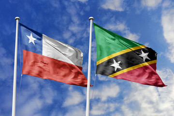The Flags of Chile and Saint Kitts and Nevis Waving Together, Symbolizing Diplomatic Relations...