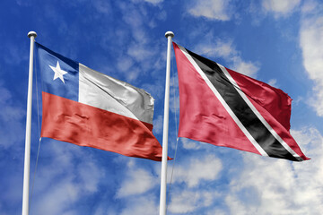 The Flags of Chile and Trinidad and Tobago Waving Together, Symbolizing Diplomatic Ties Between...