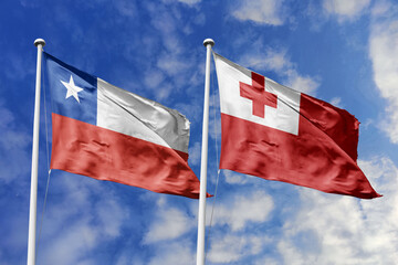 The Flags of Chile and Tonga Waving Together, Symbolizing Diplomatic Ties Between Distant Nations.